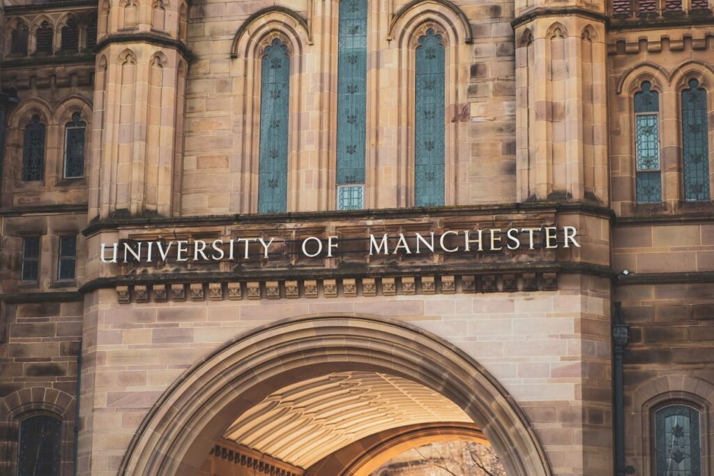 Close-up of the University of Manchester's architectural details with Gothic features.